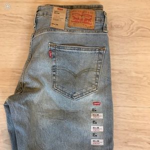 Mens Levi’s blue jeans - never worn w/ tags